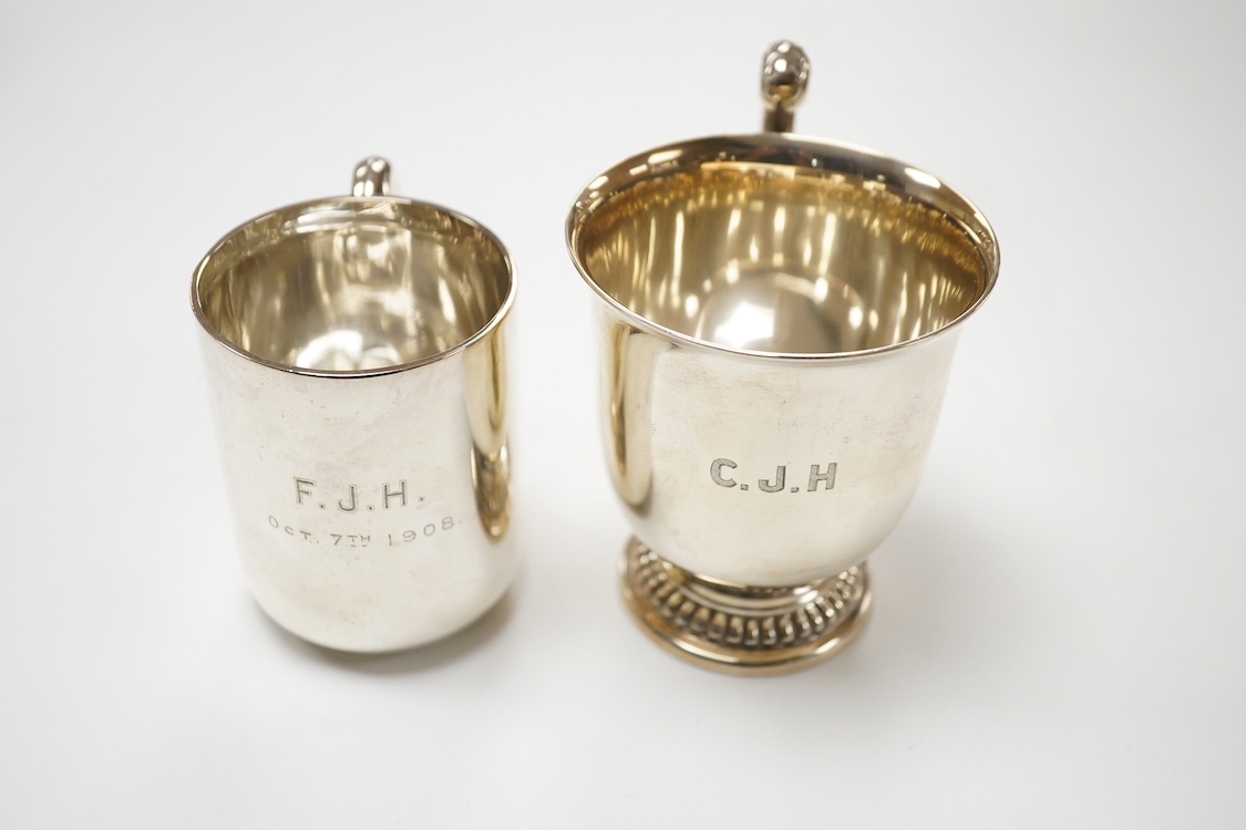 An Edwardian silver christening mug, wit engraved initials, Robinson & Co Ltd, London, 1907, height 99mm and one other smaller silver christening mug, James Dixon & Sons, Sheffield, 1907, 8.3oz.